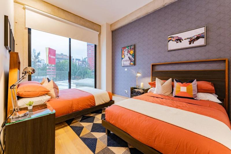 Spacious Roma Norte Loft with Art & City Views - image 13