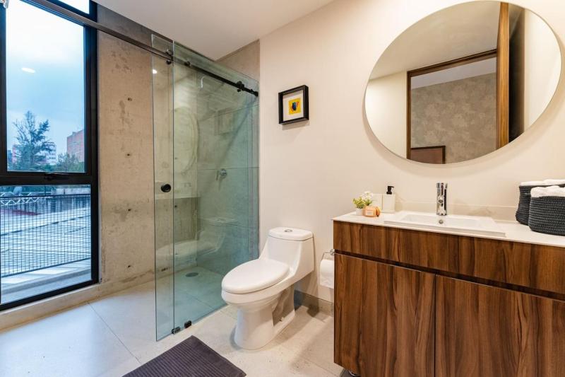 Spacious Roma Norte Loft with Art & City Views - image 12