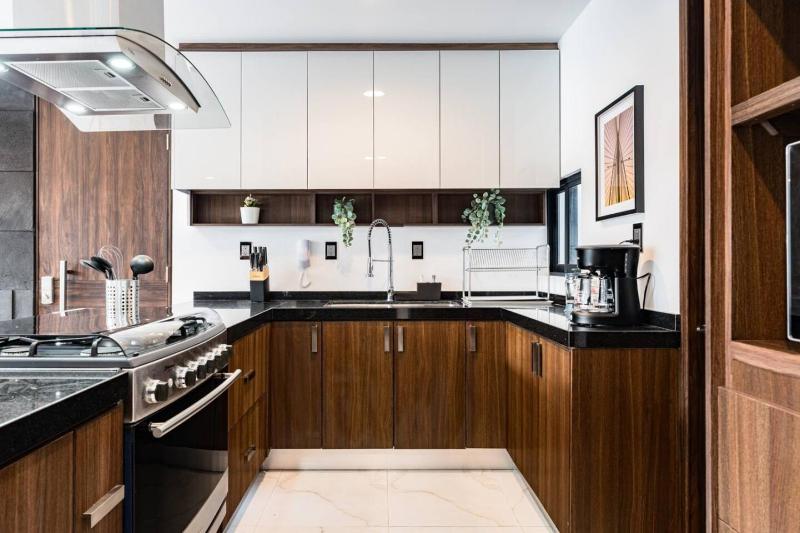 Urban Elegance Apartment with Balcony Views - image 22