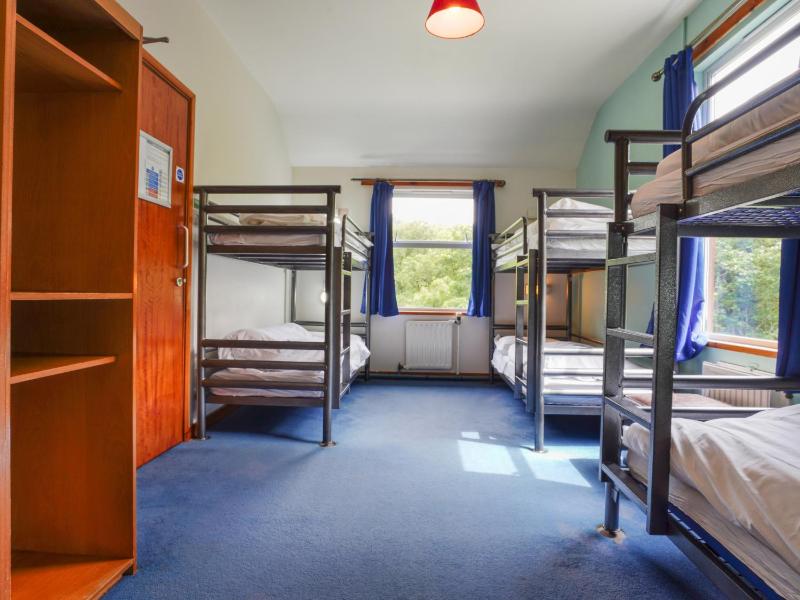 Bunk Bed in Male Dormitory Room with Shared Bathroom image 2
