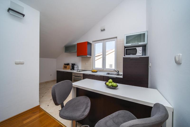 Three-Bedroom Apartment with Balcony image 1