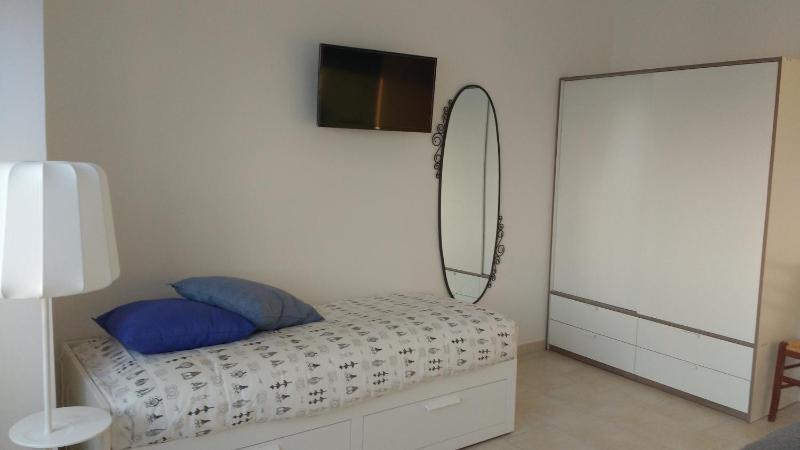 Quadruple Room with Private Bathroom image 2