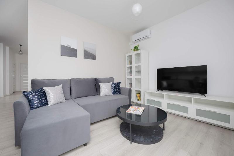 Family Apartment Cybernetyki with AC and Parking by Noclegi Renters - image 1