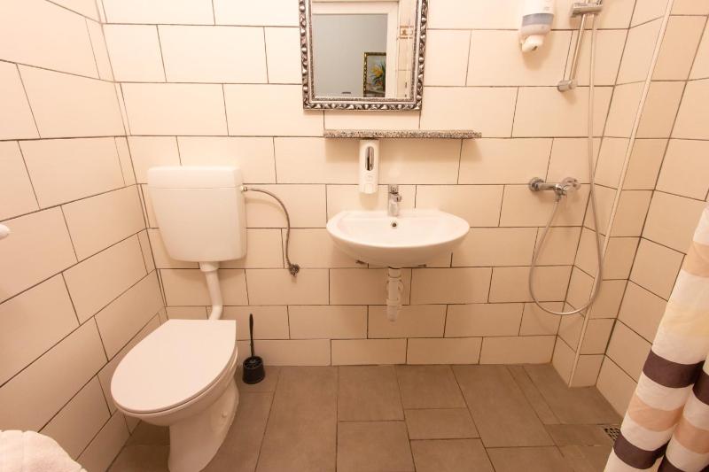 Single Bed in 12-Bed Attic Dormitory Room image 1