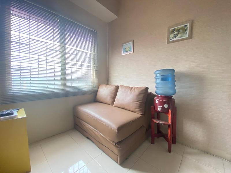 Cozy 2BR at Pinewood Apartment By Travelio - image 3