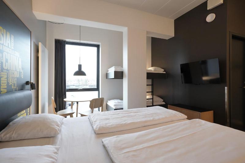 Standard Family Room with King Bed and Bunk Beds image 1