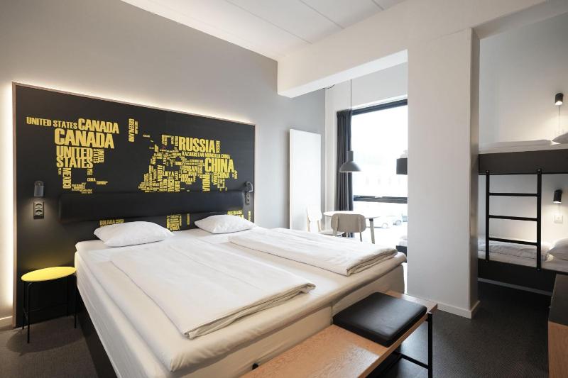 Standard Family Room with King Bed and Bunk Beds image 3