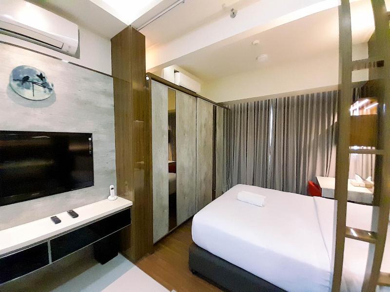 Cozy Studio Room at Uttara The Icon Apartment By Travelio - image 11