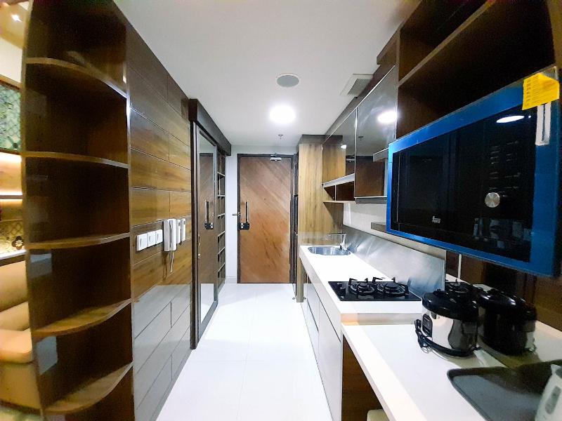 Cozy Studio Room at Uttara The Icon Apartment By Travelio - image 3