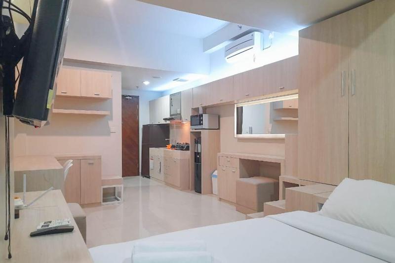 Best Homey and Modern Studio at Uttara The Icon Apartment By Travelio - image 12