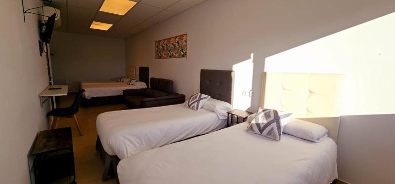 Quadruple Room with Private Bathroom image 3