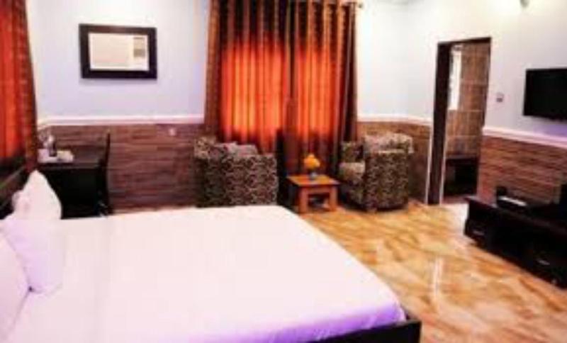Dilida Guest Suites - Guest Room - image 12