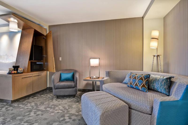 Queen Room with Two Queen Beds and Sofa Bed image 1
