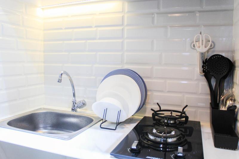 Brand New and Best Studio Apartment at B Residence By Travelio - image 9