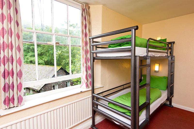 Bunk Bed in Male Dormitory Room with Shared Bathroom image 2