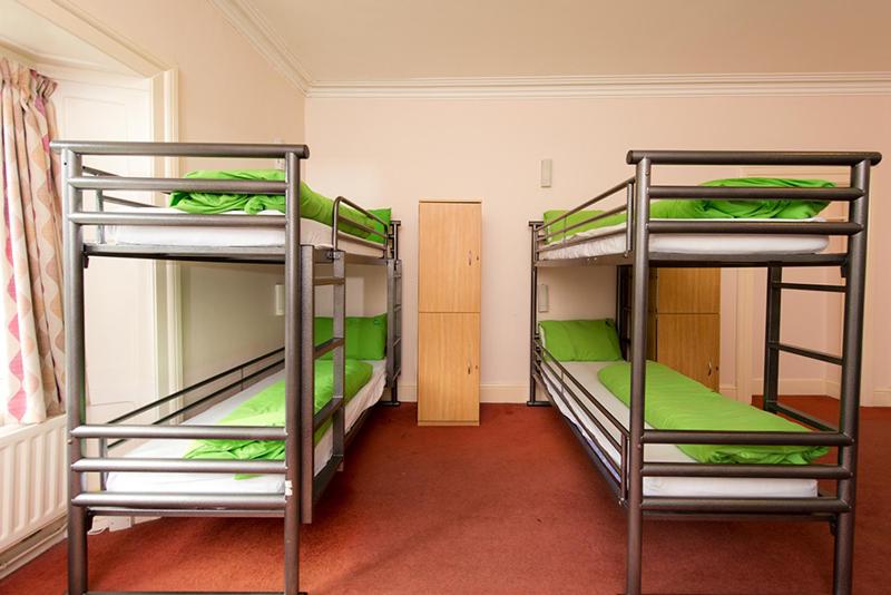 Bunk Bed in Male Dormitory Room with Shared Bathroom image 4
