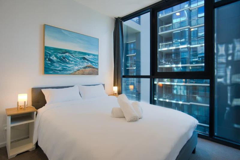 Ultimate Comfort - Modern 3BR Apt with Pool and Gym - image 8