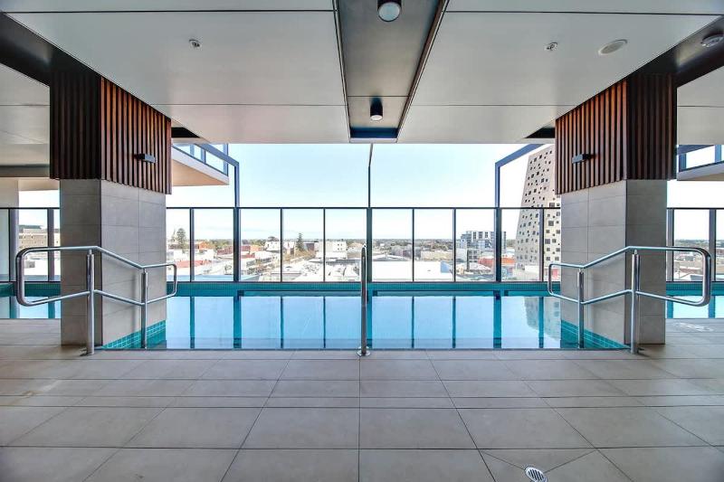Ultimate Comfort - Modern 3BR Apt with Pool and Gym - image 16