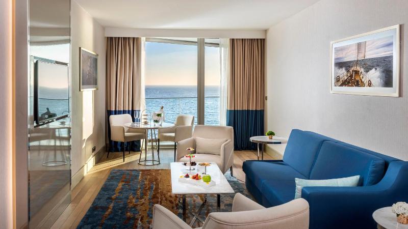 1 King Junior Suite Sofa Bed Sea View + Club Lounge Access image 3