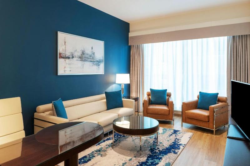 Business Suite King with Balcony - Complimentary shuttle service to Dubai Mall and Kite Beach image 3