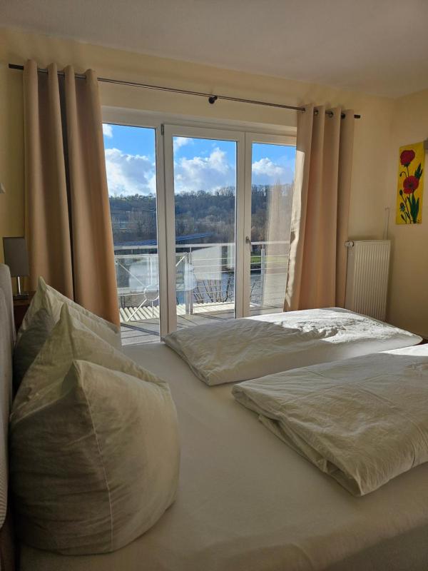 One-Bedroom Apartment with Balcony and Water View image 3