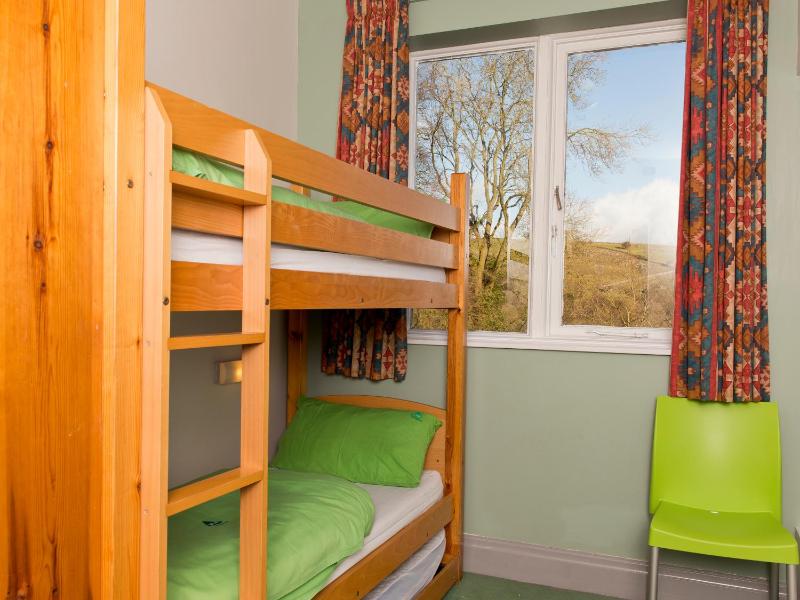 Bunk Bed in Male Dormitory Room with Shared Bathroom image 4