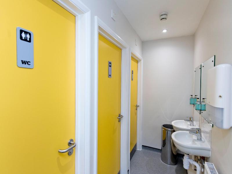 Bunk Bed in Male Dormitory Room with Shared Bathroom image 3