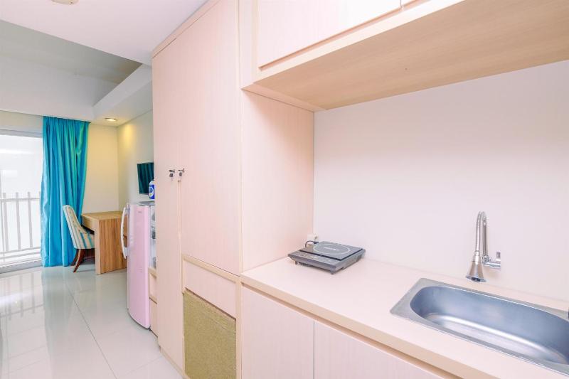Homey and Nice Studio Bogor Icon Apartment By Travelio - image 12