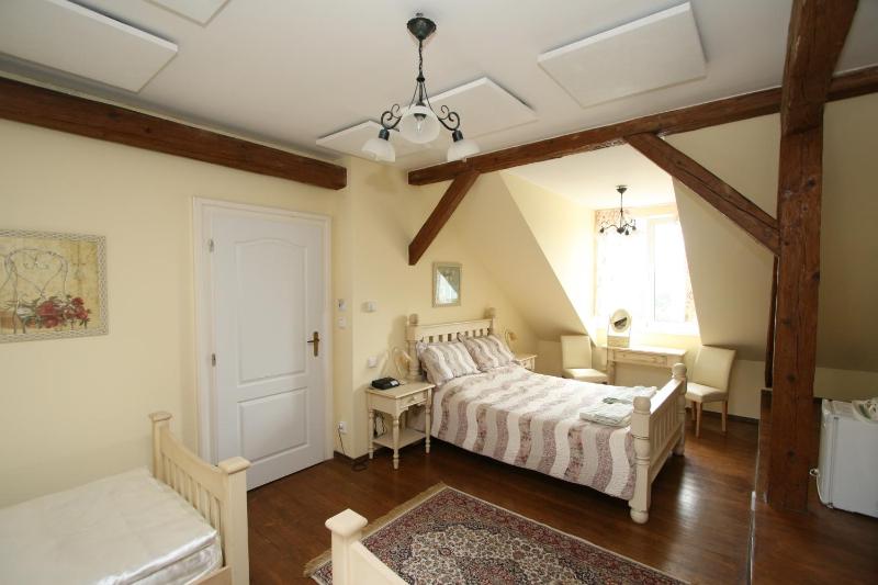 Quadruple Room with Private Bathroom image 2