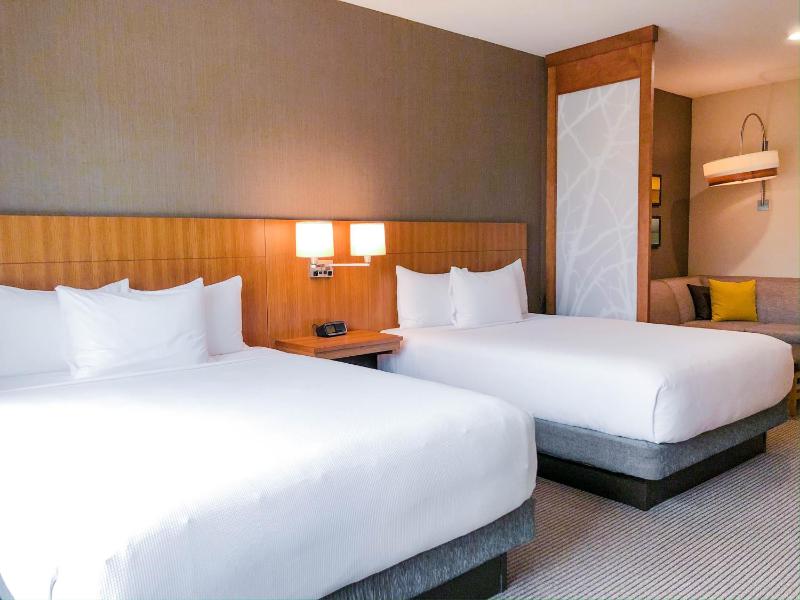 Standard Queen Room with Two Queen Beds and Sofa Bed image 3