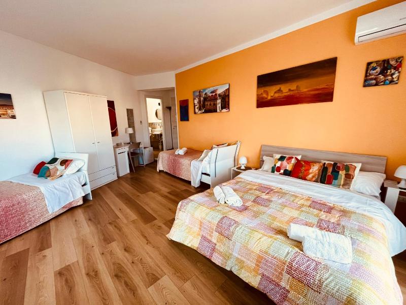 Quadruple Room with Private Bathroom image 1