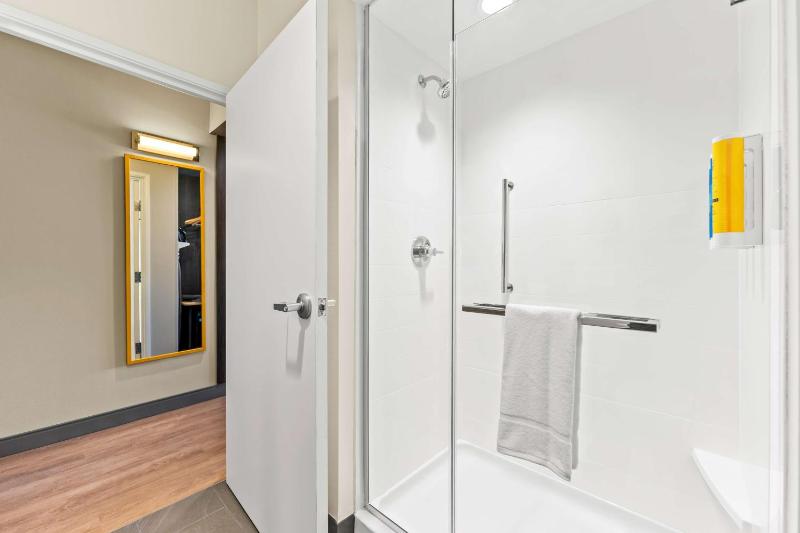 Queen Room with Two Queen Beds and Walk-In Shower image 2