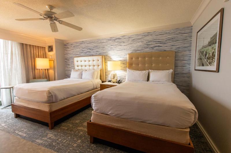 Superior Room with Two Double Beds, Balcony and Partial Ocean View image 4
