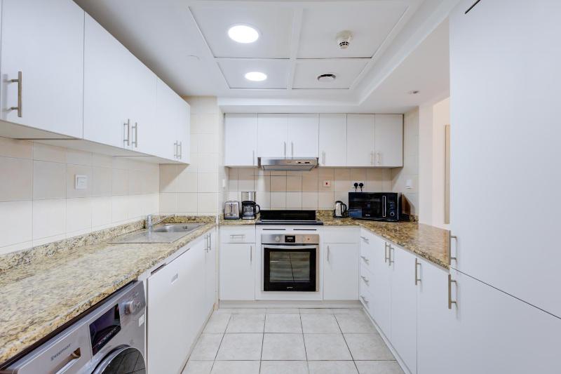 Two-Bedroom Apartment with Balcony and Lake View - Shuttle Service to JBR Beach and Access to The Market Mall image 4