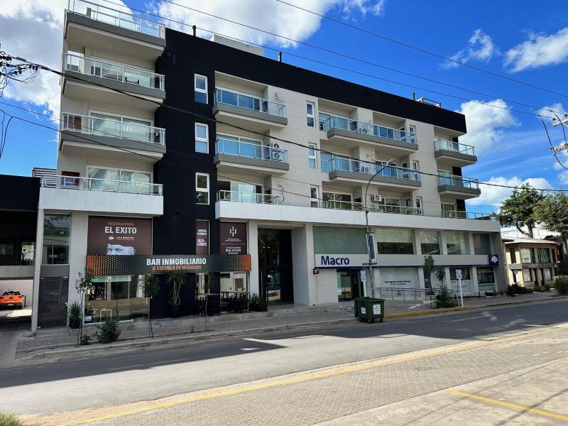 Depto céntrico en Pinamar con parrilla y piscina en la terraza - image 9