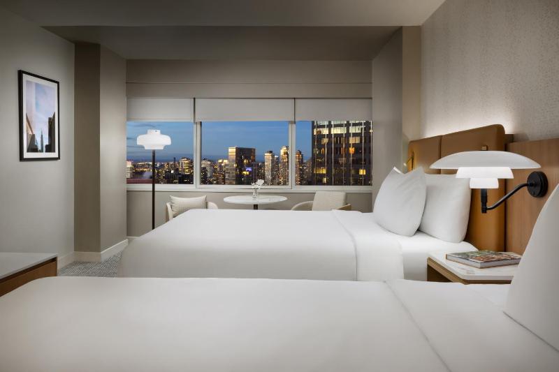 Queen Room with Two Queen Beds and City View image 2