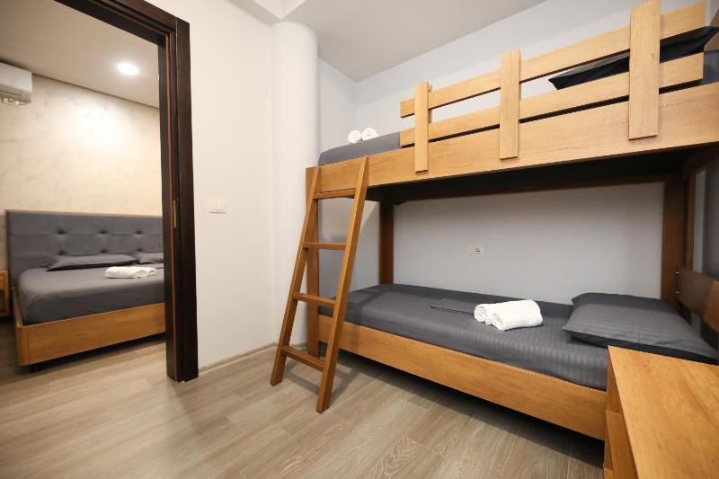 Quadruple Room with Balcony image 1