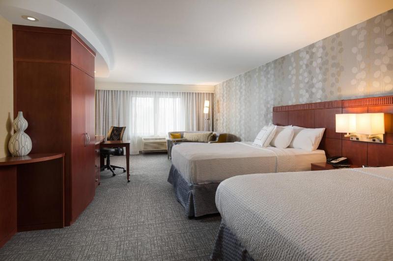 Queen Room with Two Queen Beds and Sofa Bed image 1