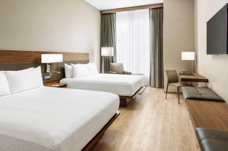 Queen Room with Two Queen Beds - Non-Smoking image 1