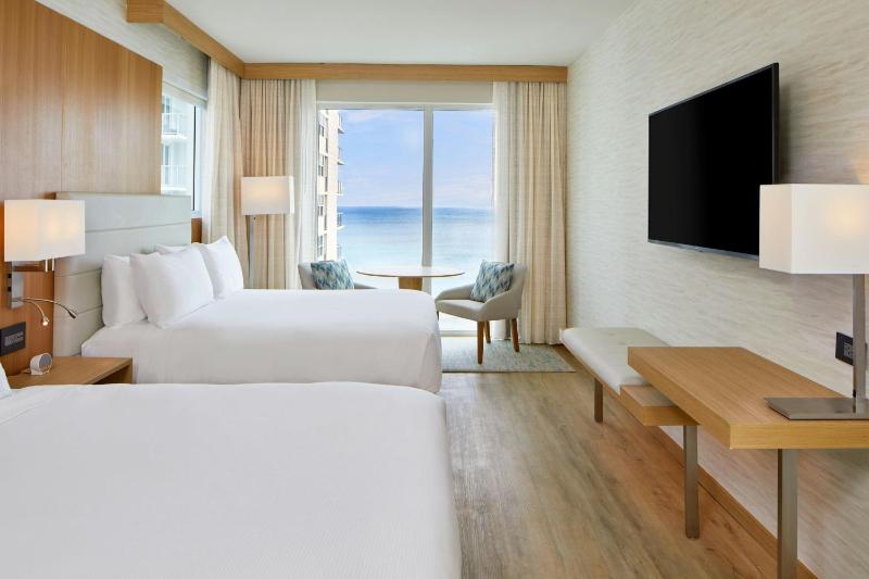 Corner Guest room with 2 queen bed, ocean view image 4
