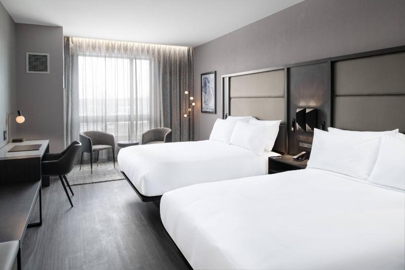 Queen Room with Two Queen Beds - Hearing Accessible image 1
