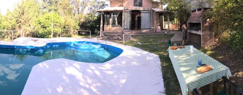 Casa Villa Carlos Paz con pileta frente al río - image 13