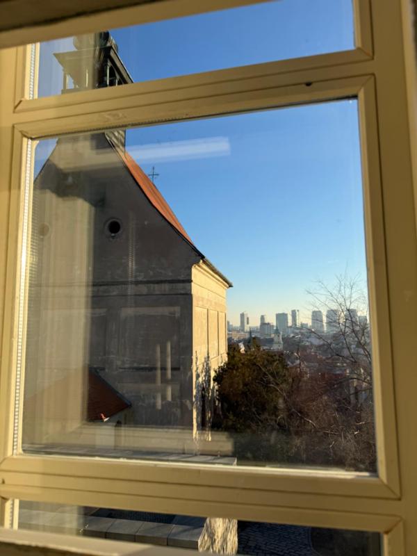 One-Bedroom Apartment with Balcony and City View image 3