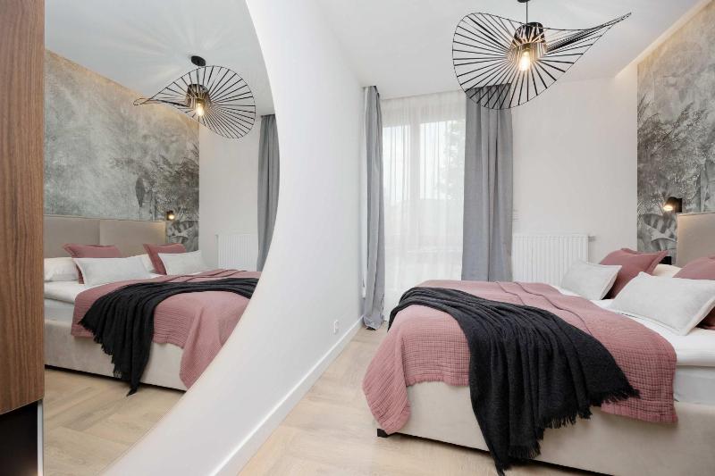 Apartment Sarmacka Wilanów with Parking Sauna & Gym by Noclegi Renters - image 2