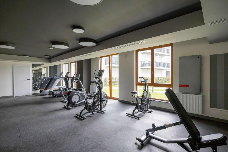Apartment Sarmacka Wilanów with Parking Sauna & Gym by Noclegi Renters - image 11