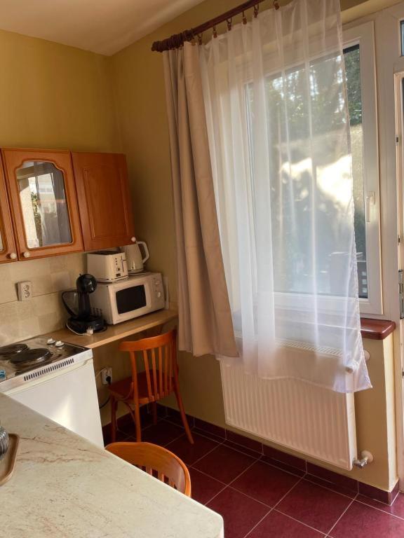 Rózsakert Apartmanház - image 43