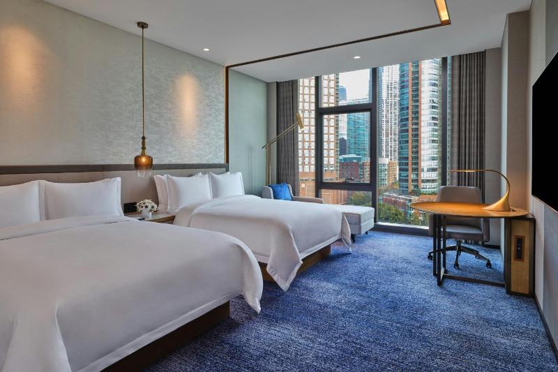 Deluxe Queen Room with Two Queen Beds and River View image 1