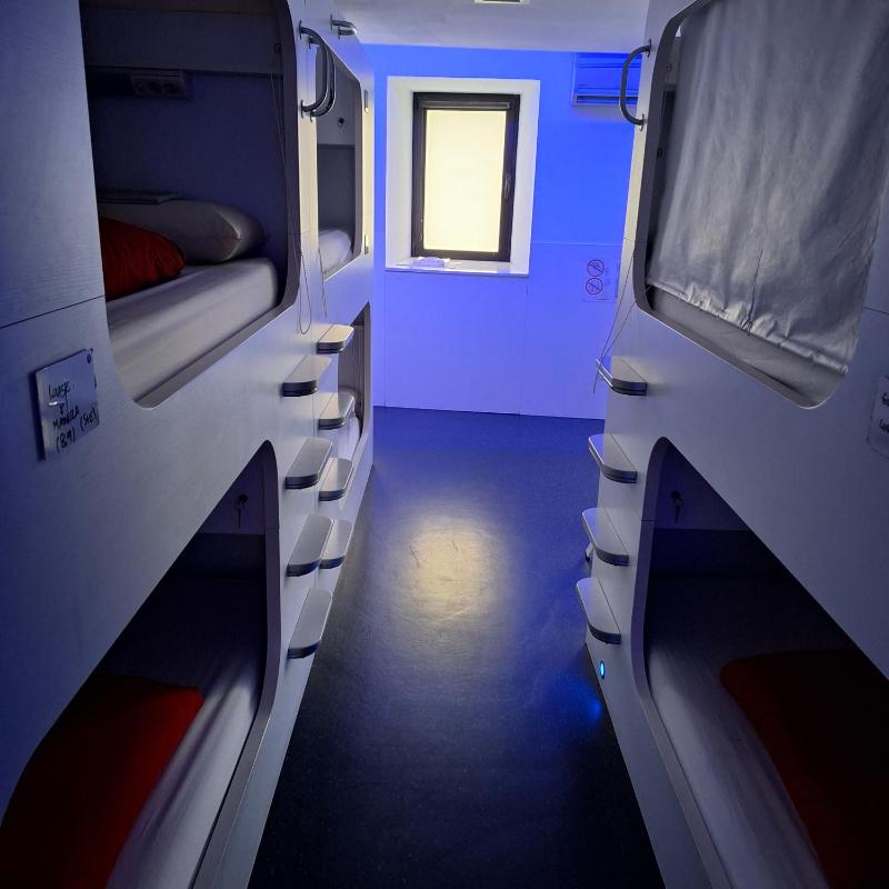 Single Bed in Dormitory Room with Shared Bathroom image 1