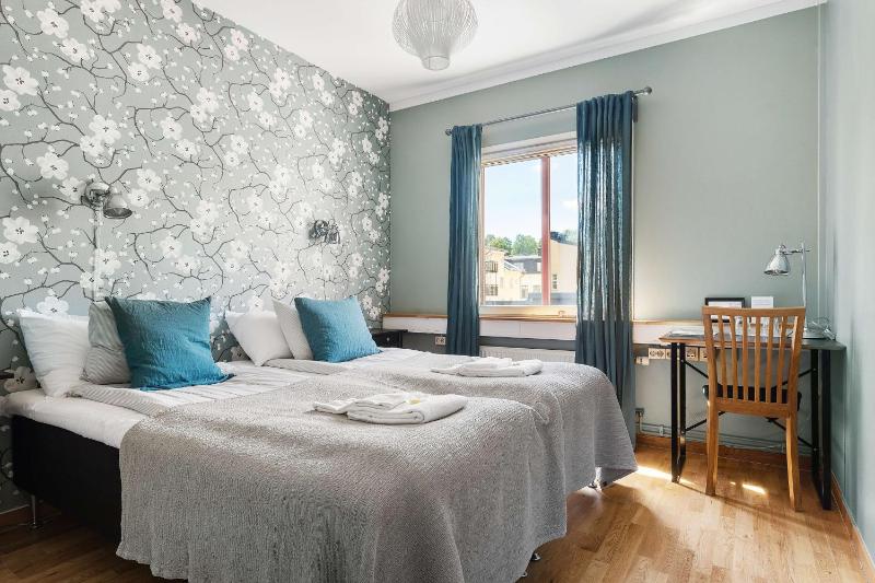 Standard Room with Four Single Beds - Non-Smoking image 1