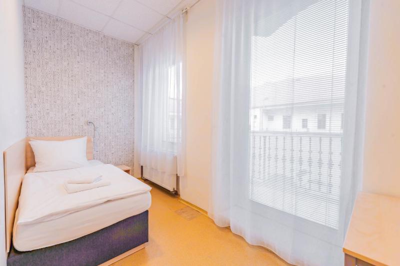 Deluxe Single Room with Balcony image 4